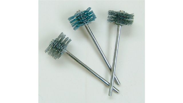 Bristle material: bristle material containing abrasive grains